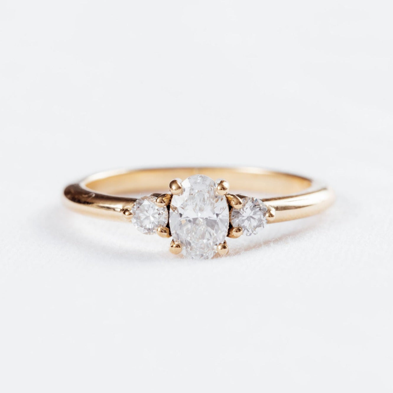 Oval and Round Three Stone