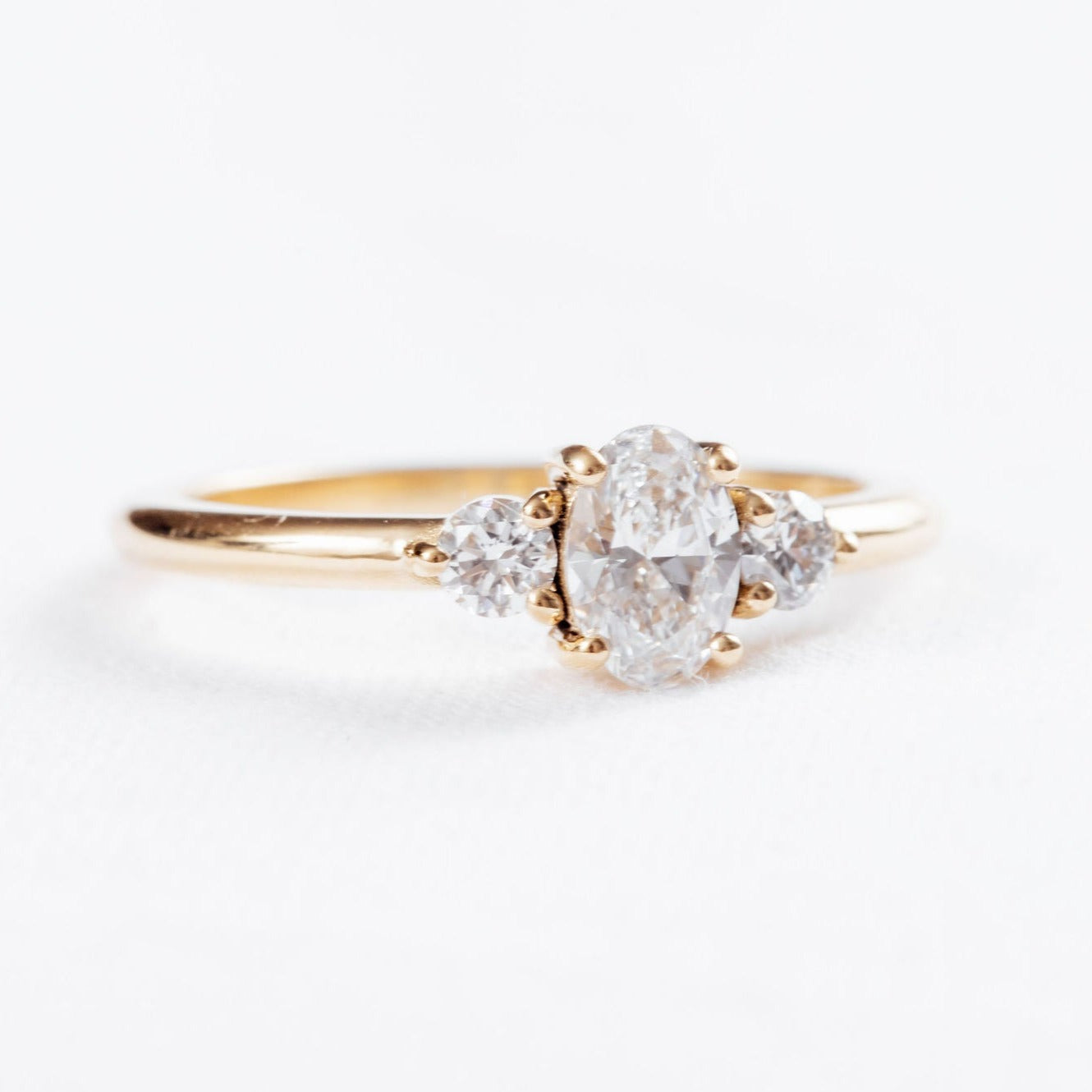 Oval and Round Three Stone